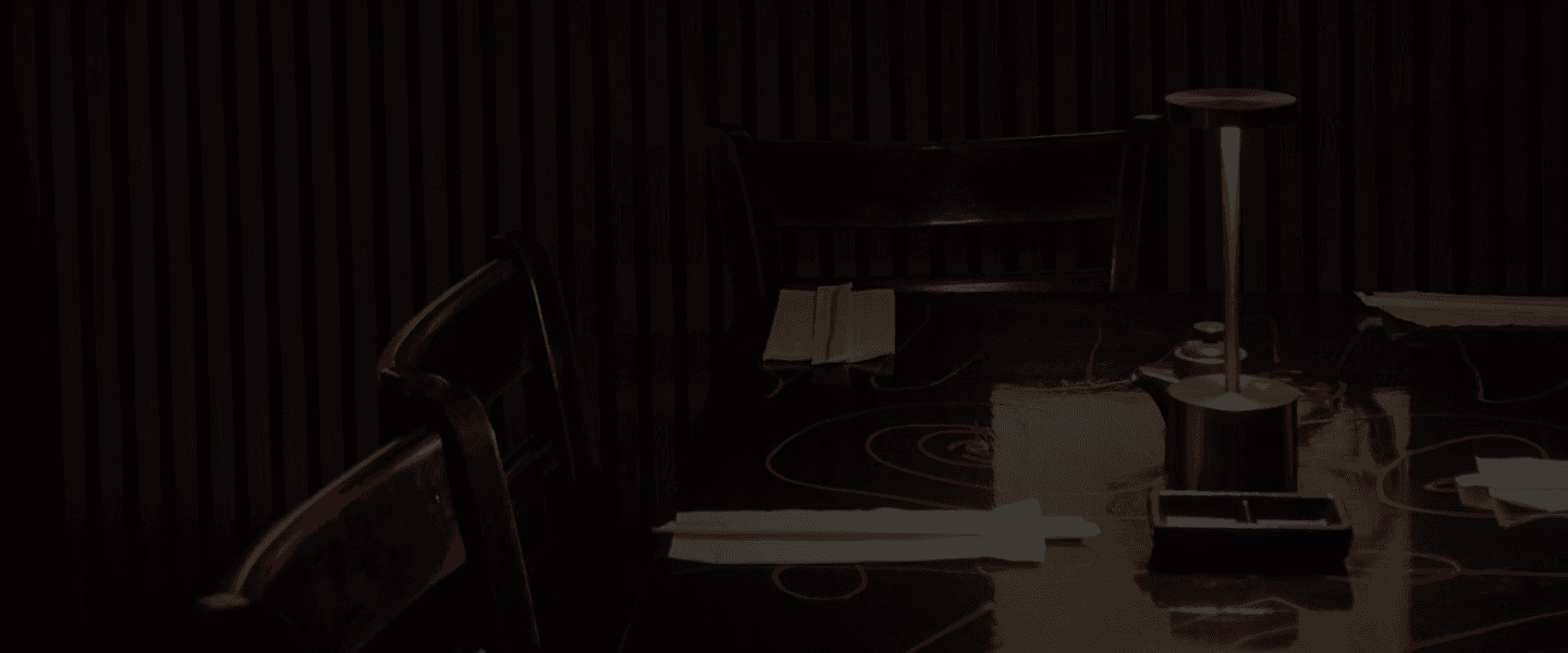 Moody table setting with cocktails and Japanese dishes at Tokyo Sushi Speakeasy